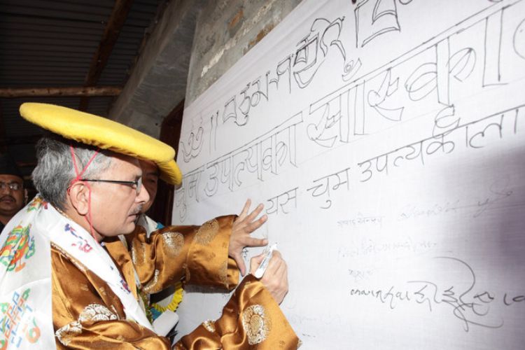 Visit of then Prime Minister Dr. Baburam Bhattarai in Shagya Festival(2012) in Tsum Valley where he is signing on the wall.